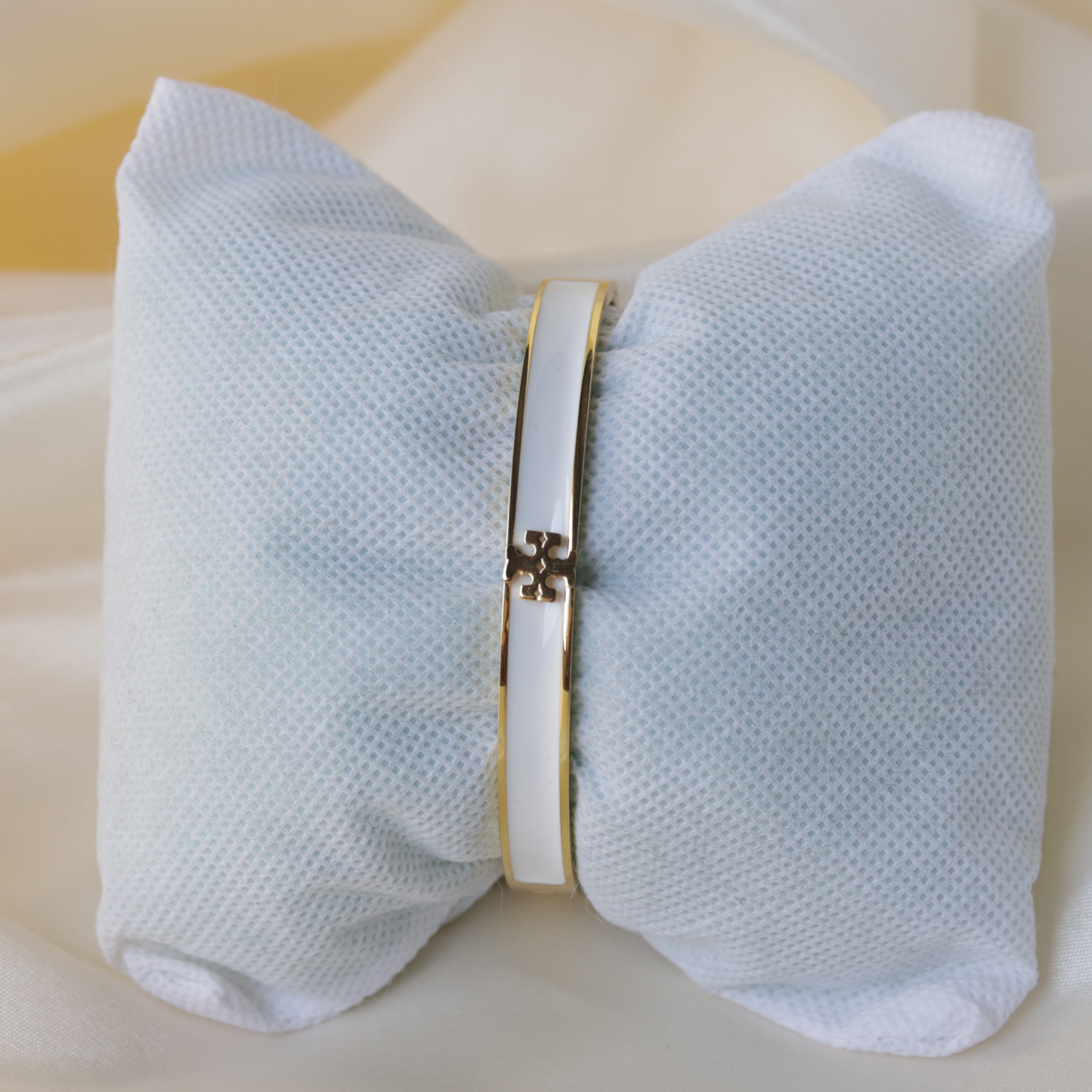 Elegant Luzura Blanc Grace Cuff with Sleek Gold-Tone Finish and Intricate Detailing