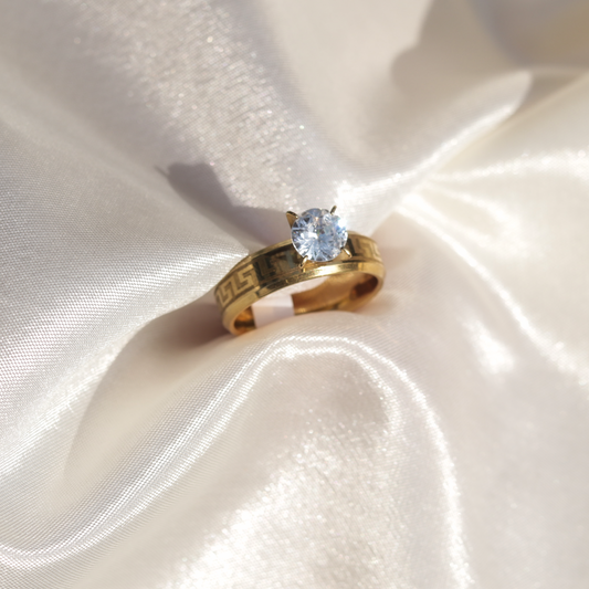 Luxurious Luzura Greek Solitaire gold-plated ring with Versace-inspired key pattern and zircon stone, perfect for bridal elegance in Lahore or party glamour in Karachi 2025.