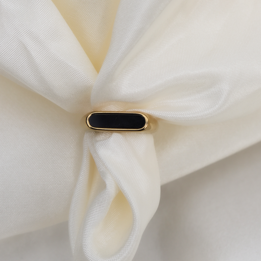 Sleek Luzura Noir Bar gold-plated ring with black enamel, perfect for minimalist chic in Karachi or wedding elegance in Lahore, Pakistan, 2025.