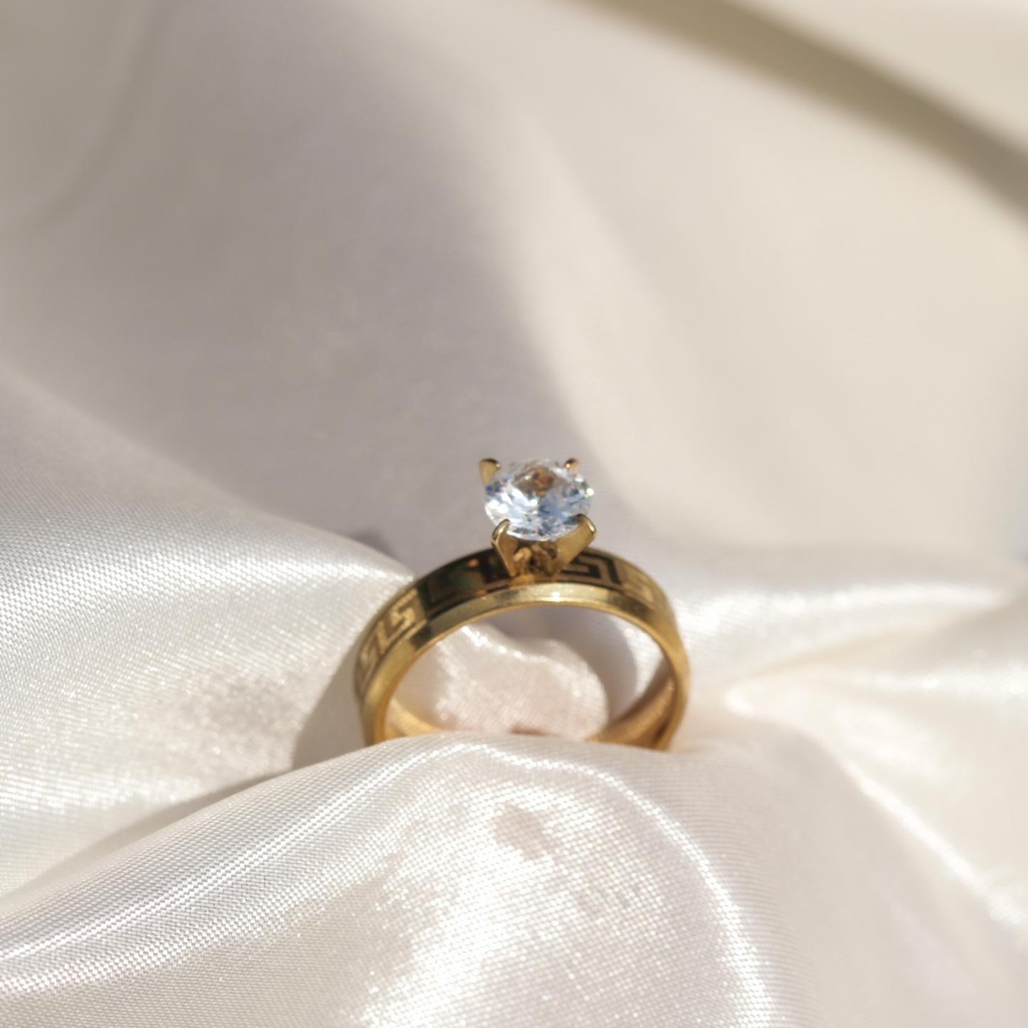 Luxurious Luzura Greek Solitaire gold-plated ring with Versace-inspired key pattern and zircon stone, perfect for bridal elegance in Lahore or party glamour in Karachi 2025.